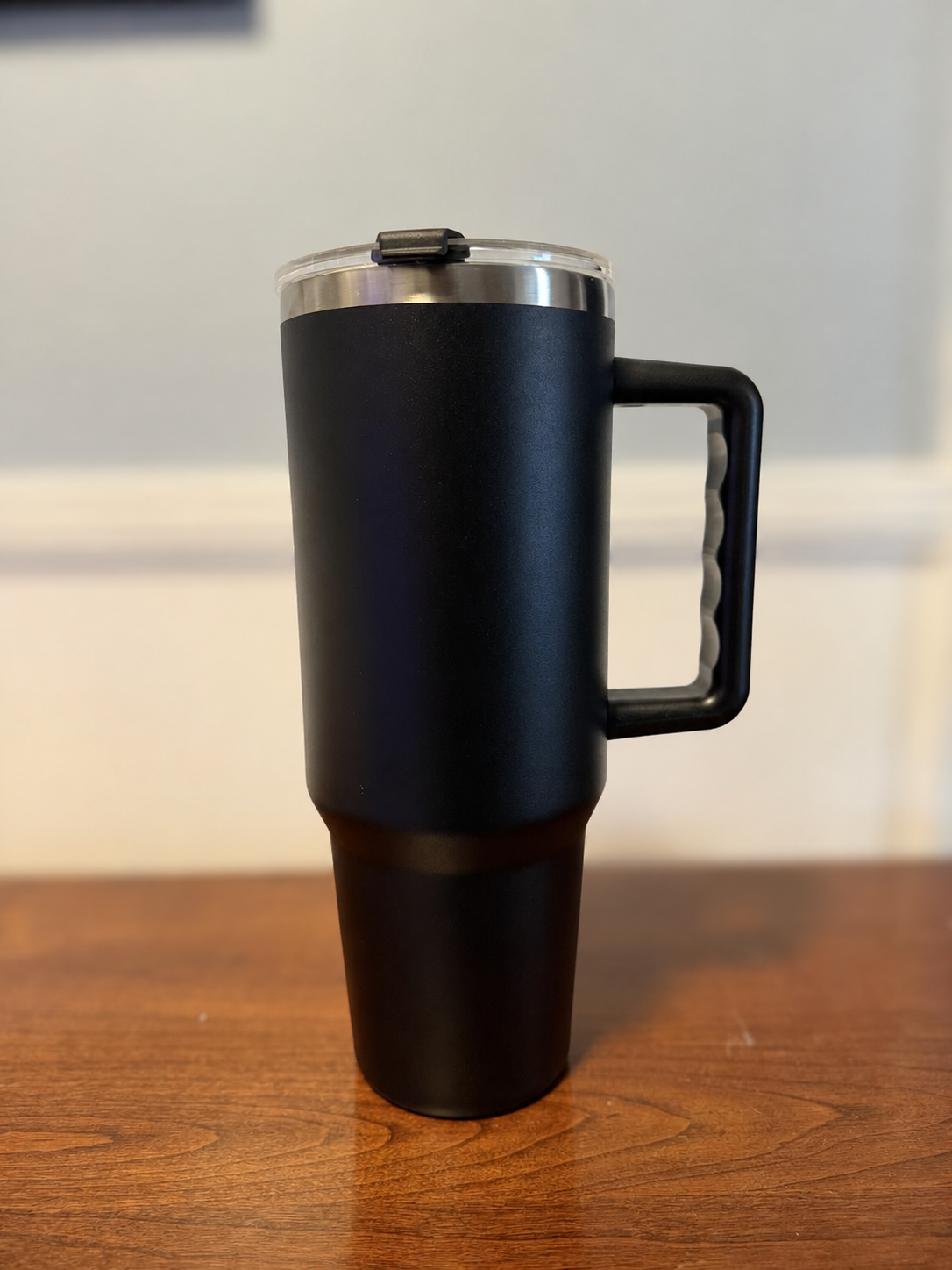 Black 40-ounce handled tumbler available for a custom order