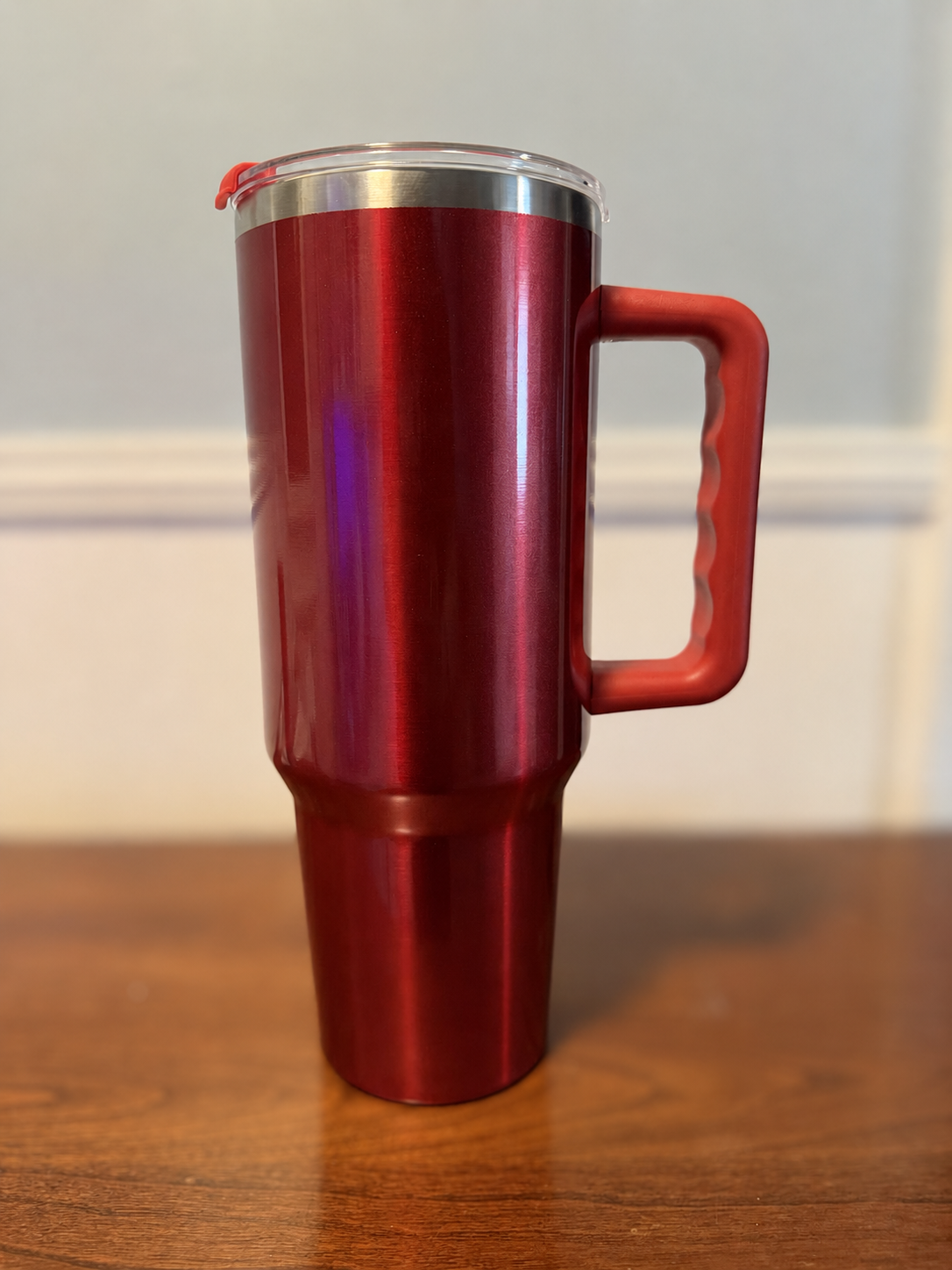 Red 40-ounce handled tumbler available for a custom order